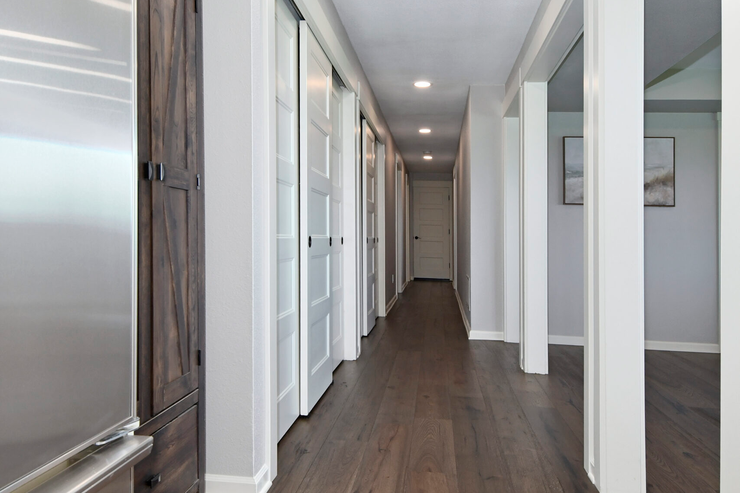 Modern home hallway with hardwood floors